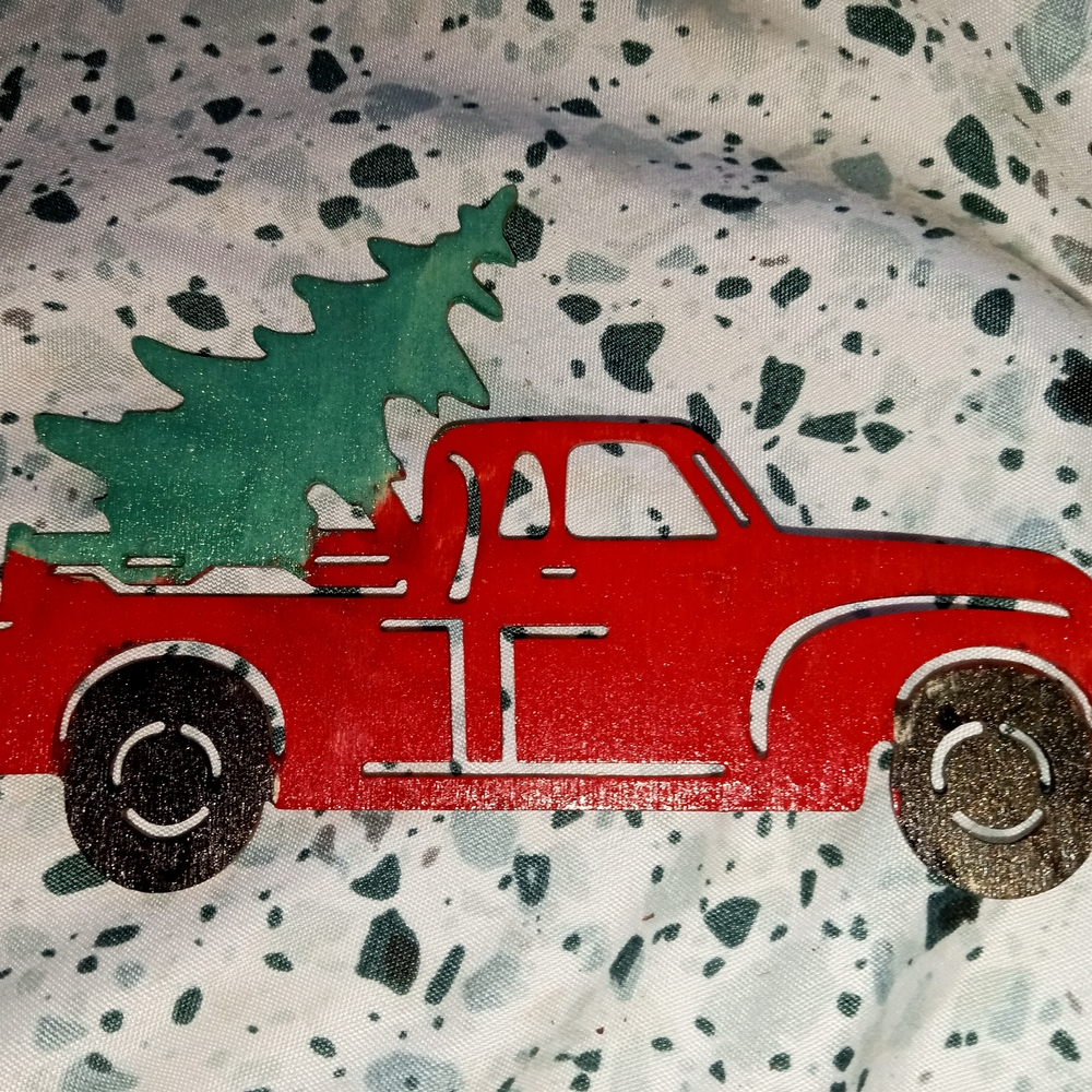 Festive Red Truck with Green Tree Decoration